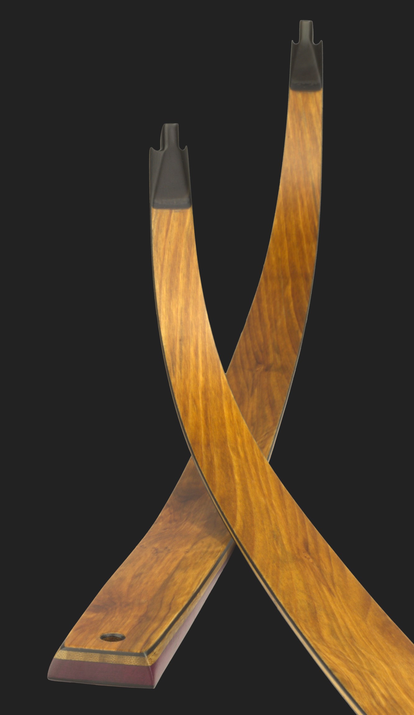 Testarossa recurve bow limbs made with yew over carbon